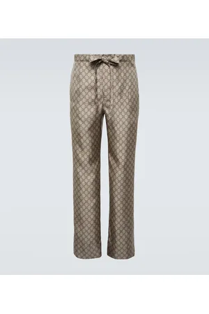 Gucci Pantalones rectos de seda con GG