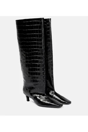 Totême Botas altas de piel grabada