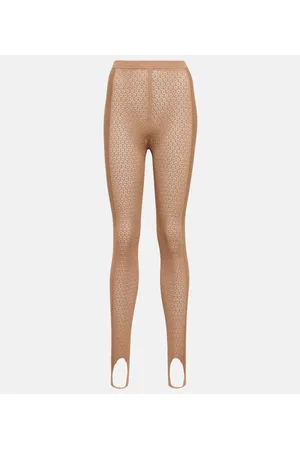 Khaite Leggings de encaje con fuseau