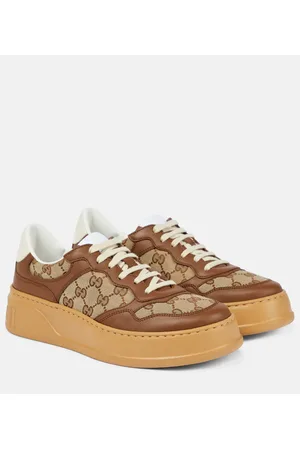 Gucci Zapatillas de lona y piel con GG