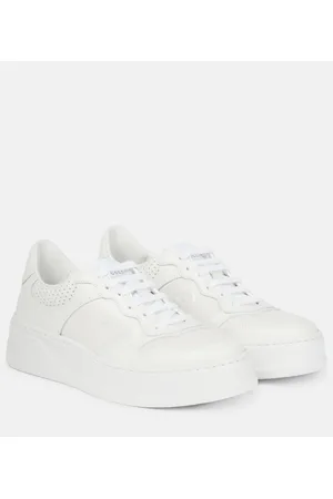 Gucci Zapatillas de piel con GG grabadas