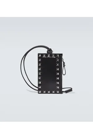 VALENTINO GARAVANI Tarjetero Rockstud de piel con correa
