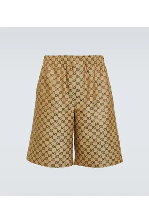 Gucci Shorts de lona GG