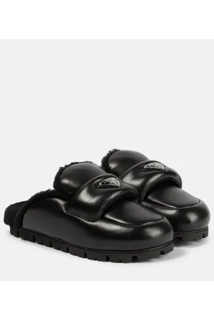 Prada Botas de piel con forro de borrego