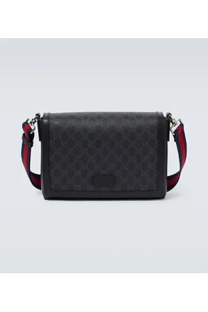 Gucci Bolso cruzado con detalles de piel y GG