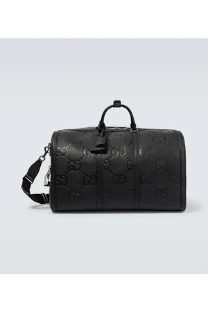 Gucci Bolso de viaje Large de piel con jumbo GG