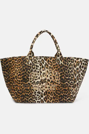 Ganni Shopper de lona con estampado de leopardo