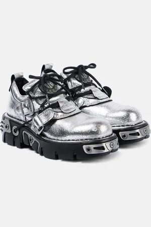 Paco rabanne X New Rock botas de piel adornadas