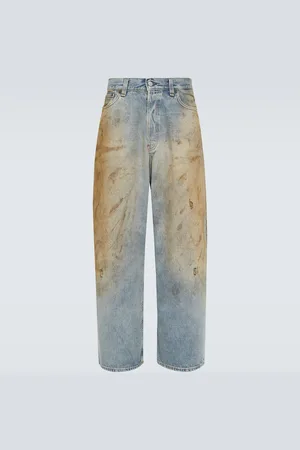 Acne Studios Jeans anchos con efecto desgastado
