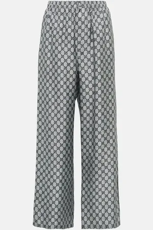 Gucci Pantalones anchos de sarga de seda con GG