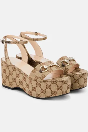 Gucci Sandalias con plataforma de lona GG con Horsebit