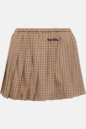 Miu Miu Minifalda de algodón plisada con logo