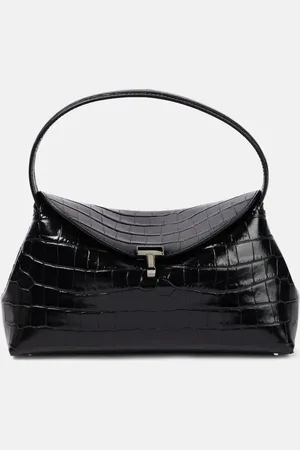 Totême Clutch T-Lock de piel grabada
