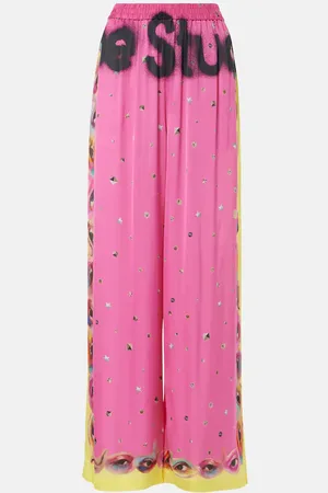 Acne Studios Pantalones palazzo estampados con logo