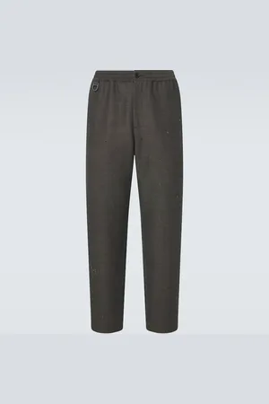 UNDERCOVER Pantalones tapered bordados