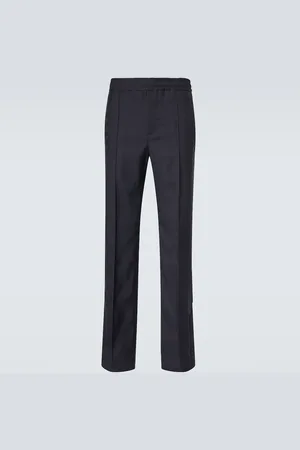 Gucci Pantalones rectos con GG de tiro medio