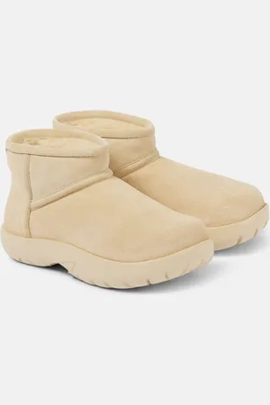 Bottega Veneta Botines Snap Mini de ante con borrego