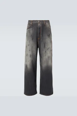 Acne Studios Jeans anchos 2023M con efecto desgastado