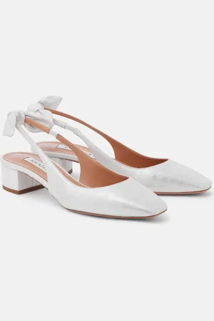 Aquazzura Salones destalonados Very Bow de piel metalizada