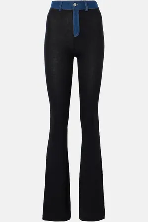 COPERNI Pantalones flared de tiro alto con denim