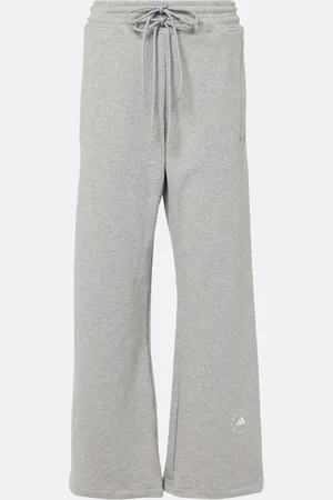 adidas Pantalones deportivos anchos de algodón