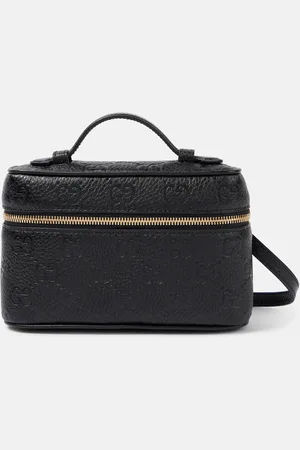 Gucci Bolso GG Mini de piel estampada