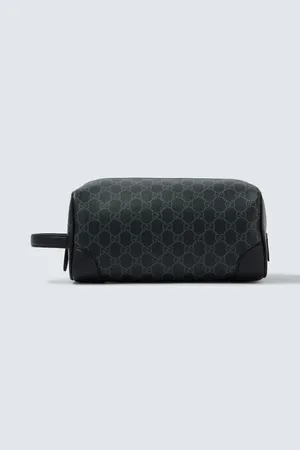 Gucci Bolso neceser mediano de lona GG