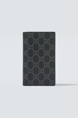Gucci Tarjetero plegable de lona GG