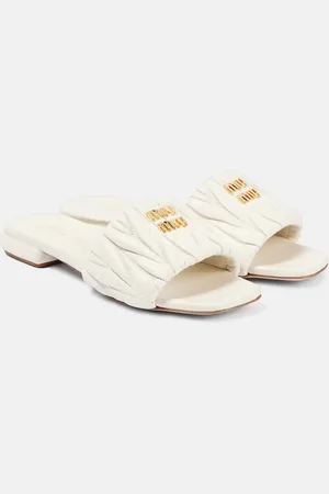 Miu Miu Chanclas de piel matelassé con logo