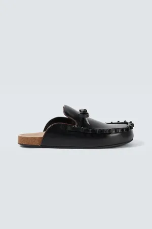 J.W.Anderson Mules de piel adornados