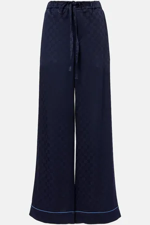 Gucci Pantalones anchos de satén con GG