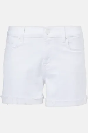 7 for all Mankind Shorts de denim de tiro medio desgastados