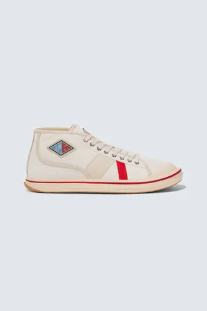 Bottega Veneta Zapatillas Eliot de lona con piel