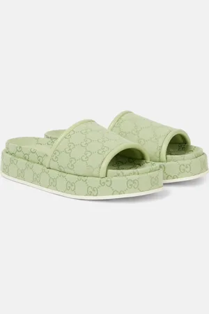 Gucci Sandalias con plataforma de lona GG