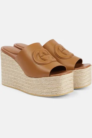 Gucci Alpargatas con cuña de piel con GG