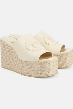 Gucci Alpargatas con plataforma de piel con GG