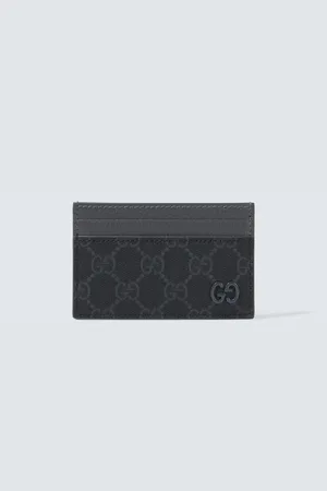 Gucci Tarjetero de lona GG y piel
