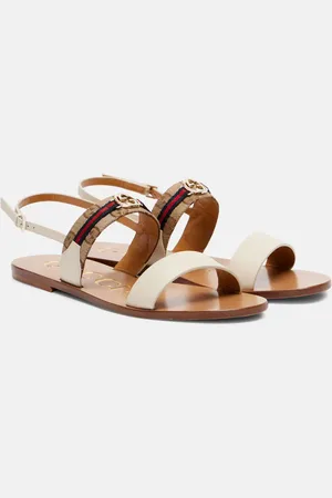 Gucci Sandalias de lona y piel con GG