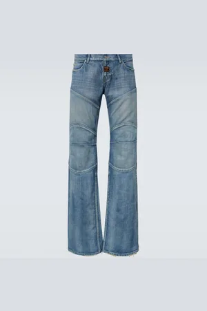 Balenciaga Jeans anchos de tiro bajo con efecto desgastado