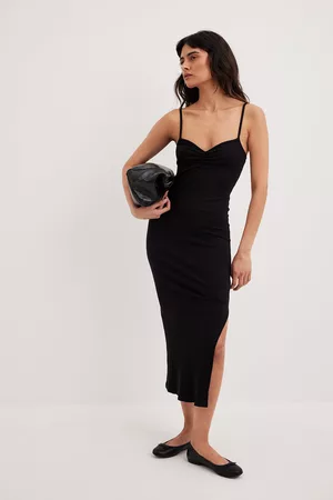 Vestido midi negro discount tirantes