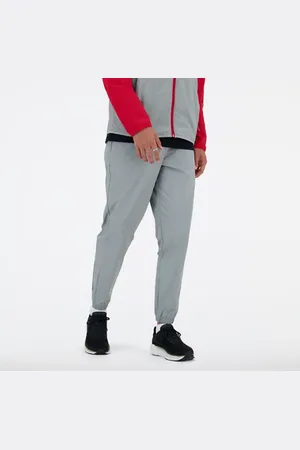 New Balance Hombre Athletics Stretch Woven Jogger, Nylon tejido, Talla L