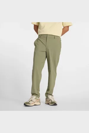 New Balance Hombre Athletics Ripstop Standard Tapered Pant 28", Polywoven, Talla L
