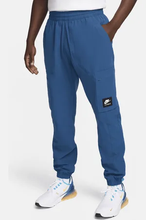 Las mejores ofertas en Pantalones de pista Nike para hombre azules
