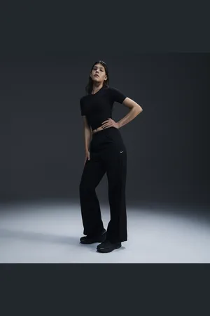 Nike Windrunner Pantalón de talle alto y tejido Woven con dobladillo abierto - Mujer