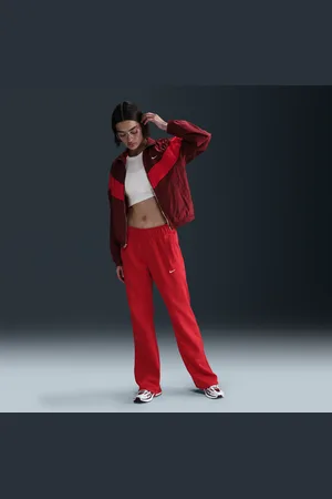 Nike Sportswear Windrunner Pantalón entallado de tejido Knit y talle medio - Mujer