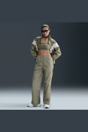 Nike Windrunner Pantalón de talle alto y tejido Woven con dobladillo abierto - Mujer
