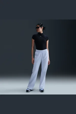 Nike Sportswear Windrunner Pantalón entallado de tejido Knit y talle medio - Mujer