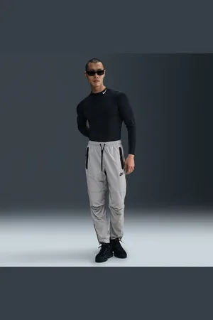 Nike Tech Pantalón de tejido Woven con dobladillo abierto - Hombre