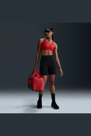 Nike Universa Mallas cortas de talle alto y sujeción media de 20 cm con bolsillos - Mujer