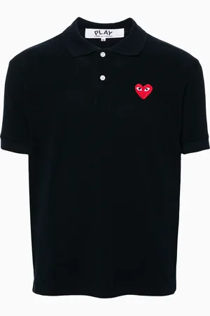 Comme des Garçons Polo con parche corazón